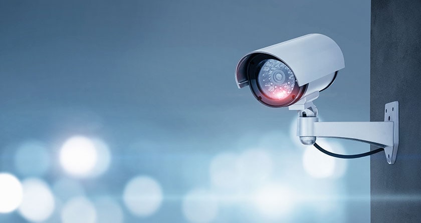 Close up of CCTV camera over defocused background with copy spac